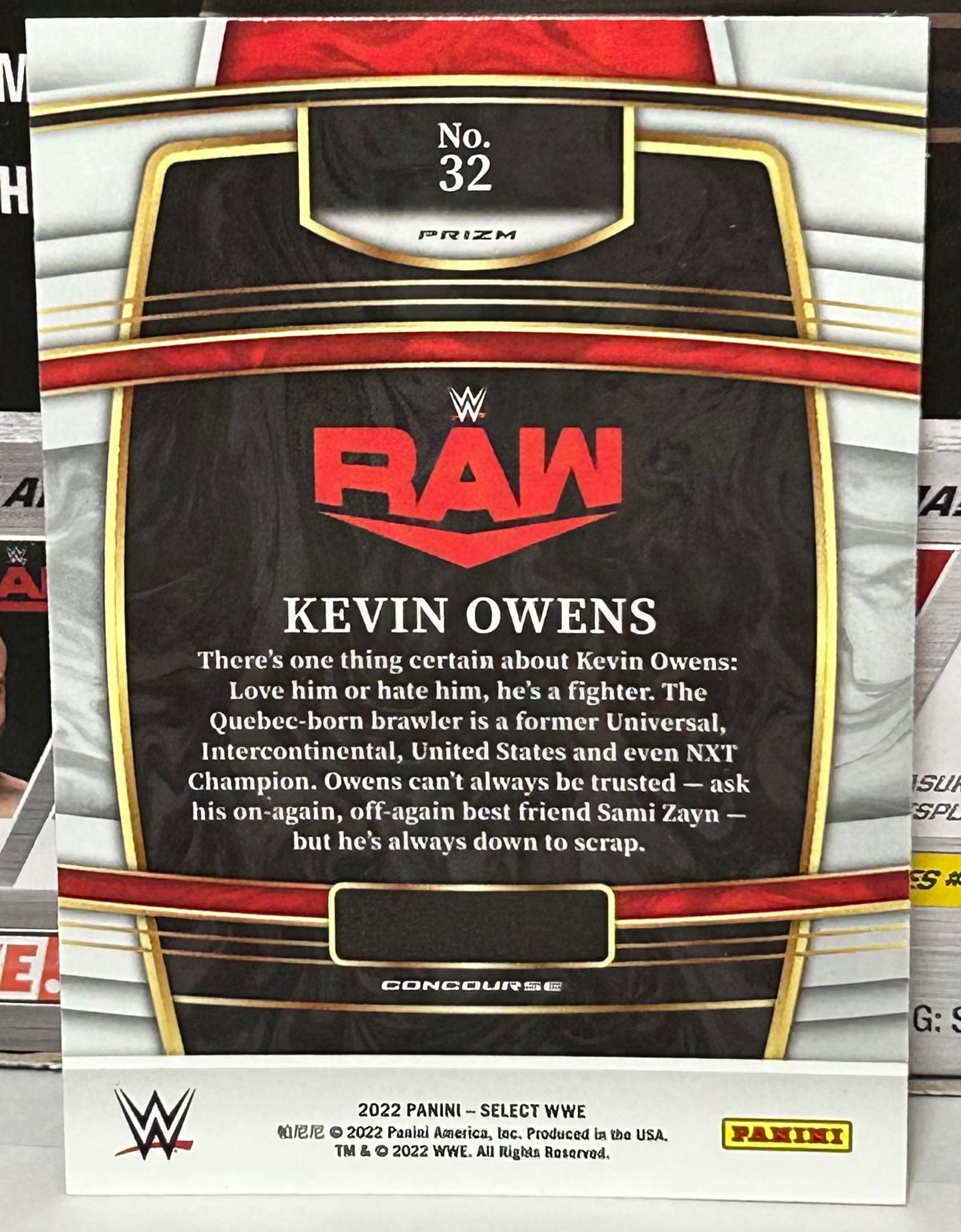 Kevin Owens 2022 WWE Panini Select Orange Wave Prizm Card