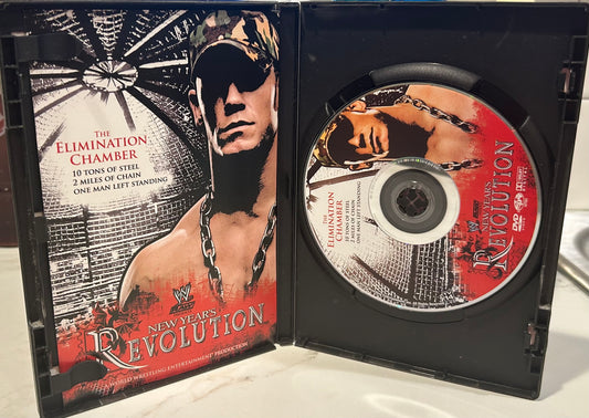 + WWE DVD “New Years Revolution, The Elimination Chamber “ (Cena, Flair, Edge & so much more)