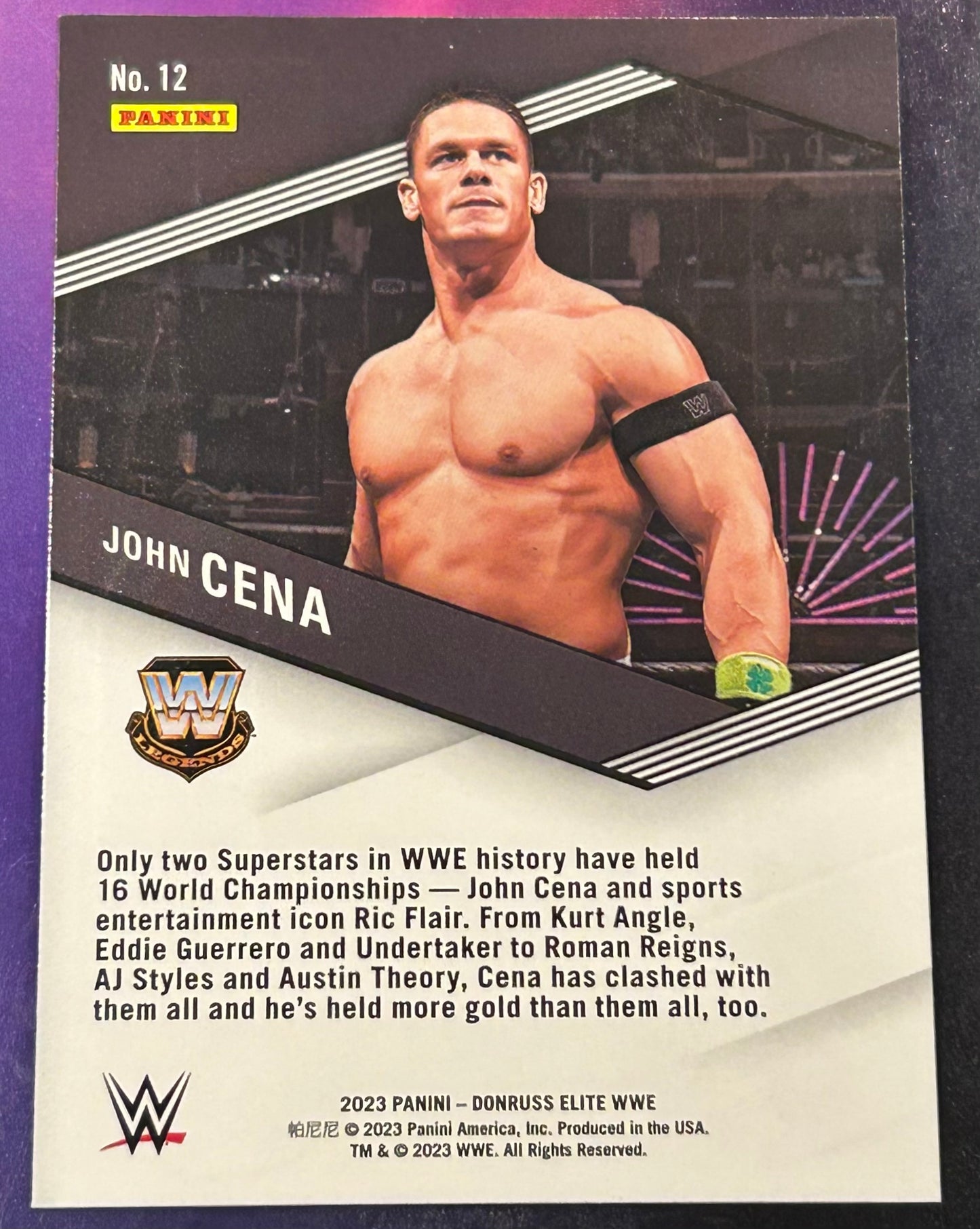 * John Cena 2023 WWE Panini Donruss Elite SPELLBOUND ”O” Green Parallel Insert Card