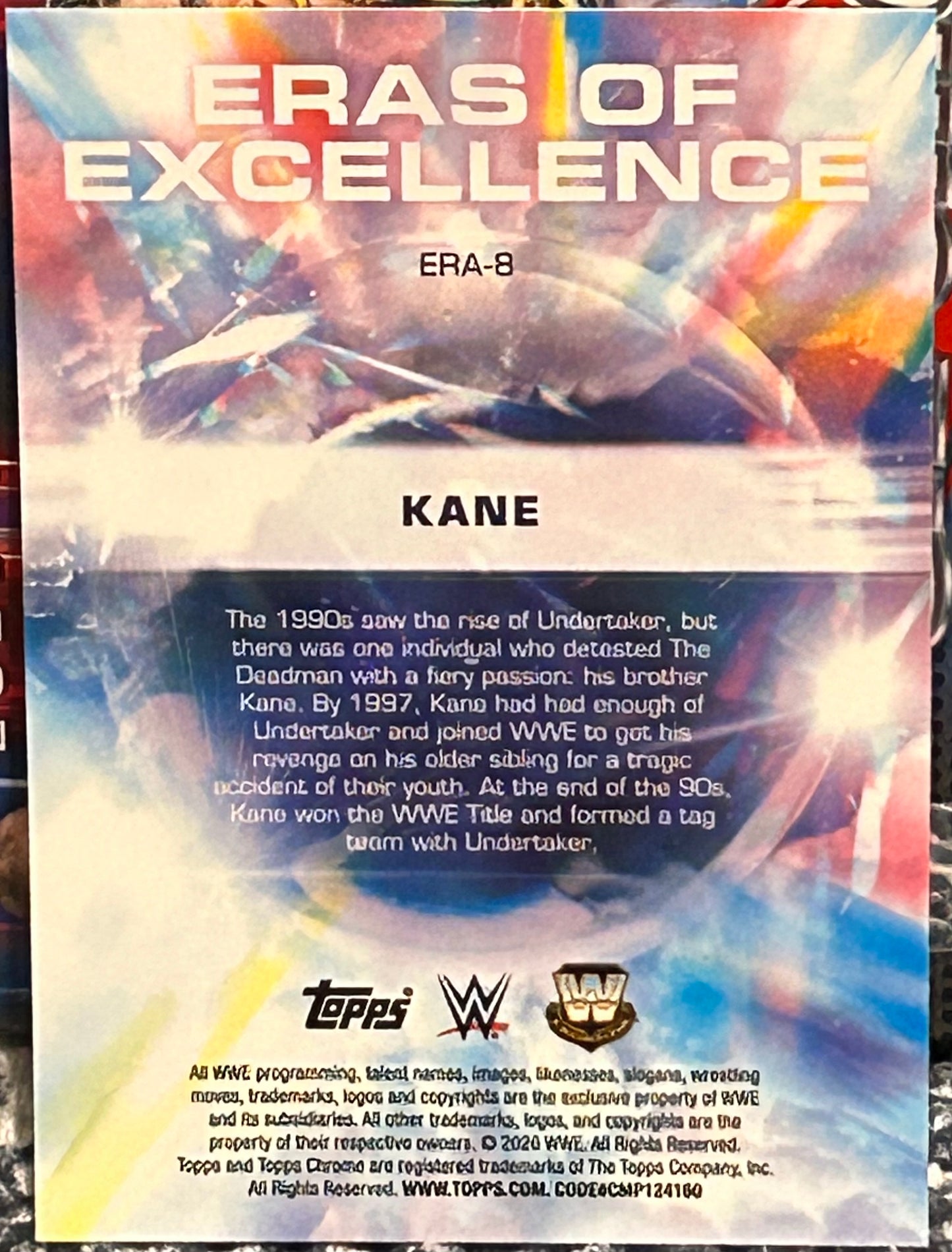 + Kane 2026 WWE Topps Chrome “Eras of Excellence” Insert Card