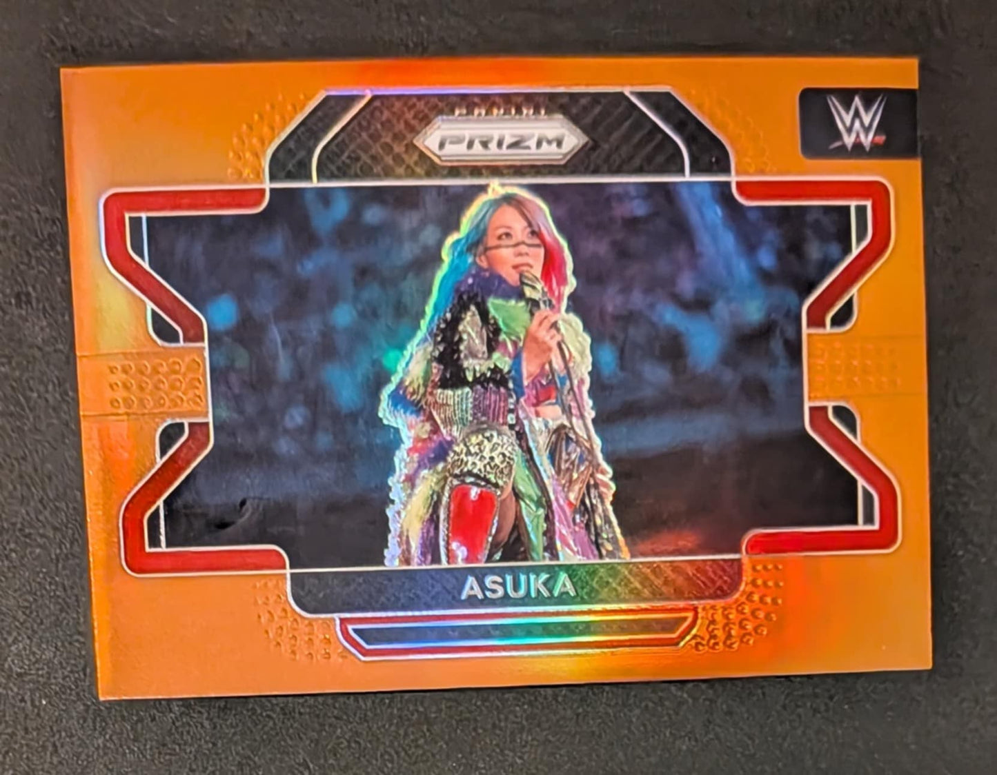 Asuka 2022 #84 Orange Prizm Serial #38/99