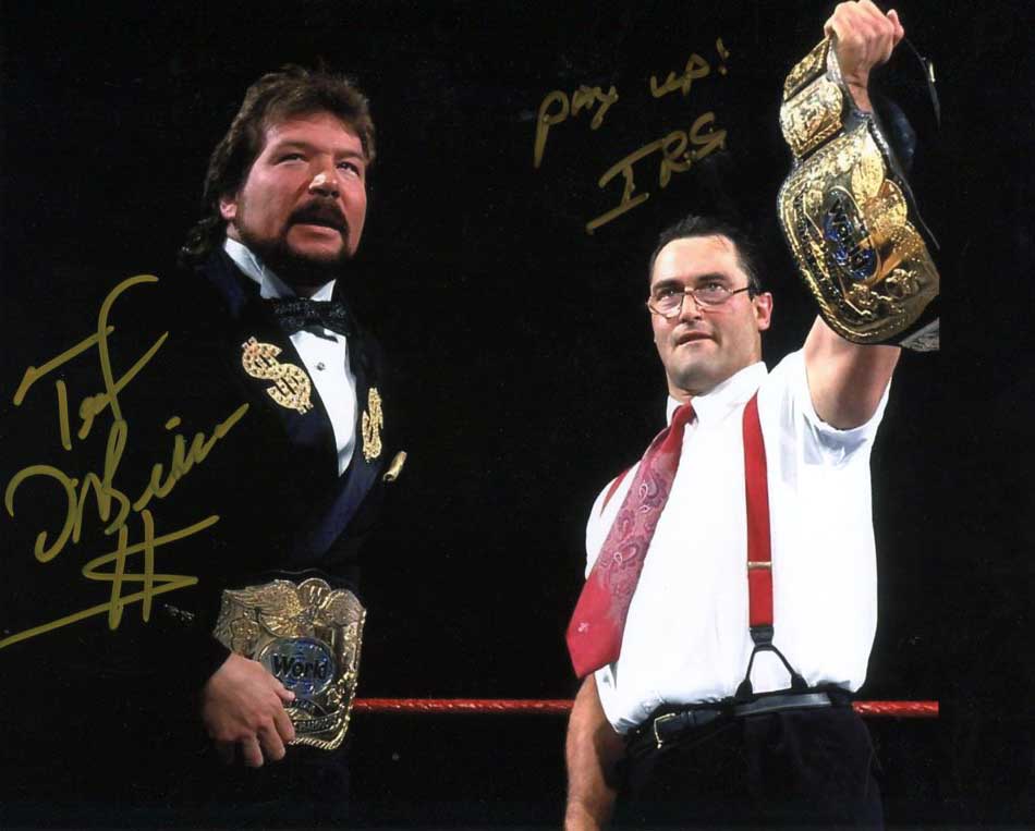 Money Inc (Dibiase & IRS) Signed Photo (Inscribed Pay Up!)