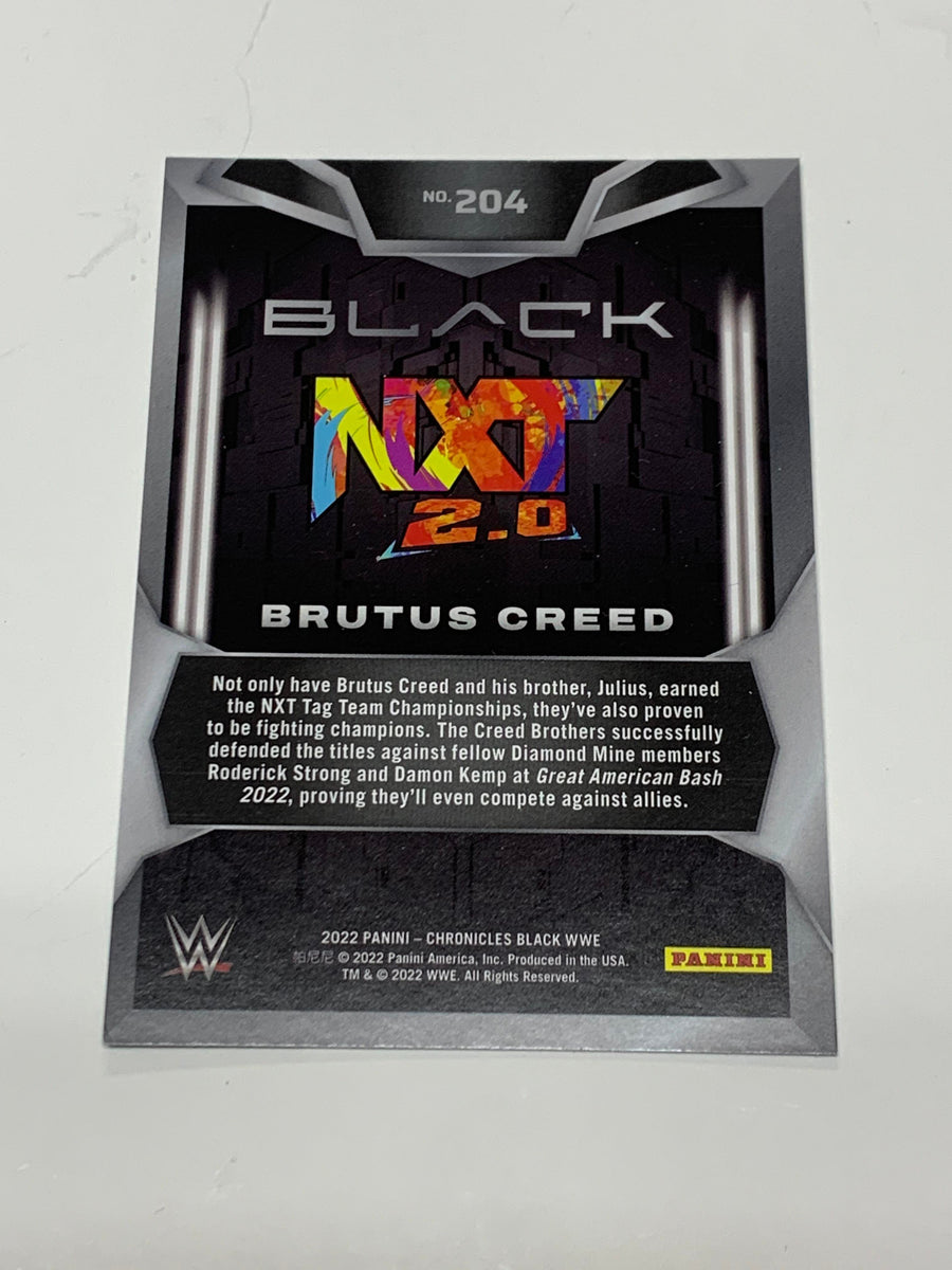 Brutus Creed 2022 WWE Panini Chronicles Black NXT 2.0 ROOKIE Card