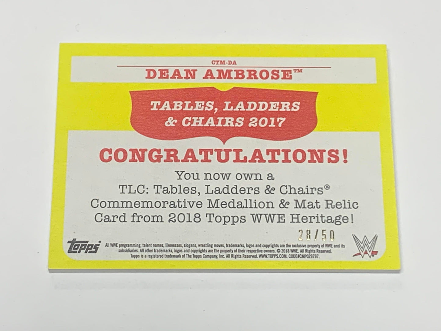 Dean Ambrose 2018 WWE Topps Heritage TLC Medallion Mat Relic #/50