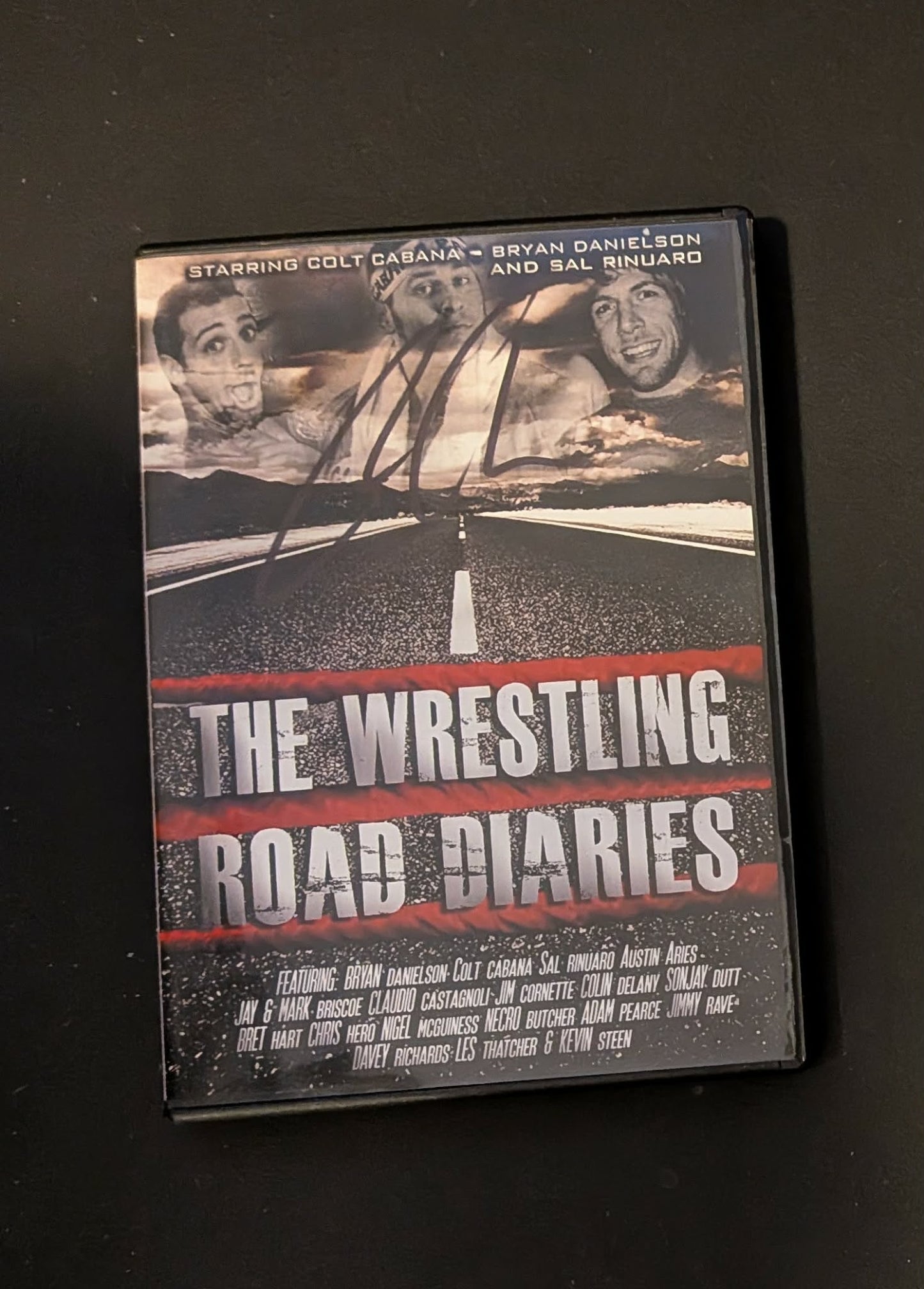 The Wrestling Road Diaries DVD Bryan Danielson (Signed by Colt Cabana)