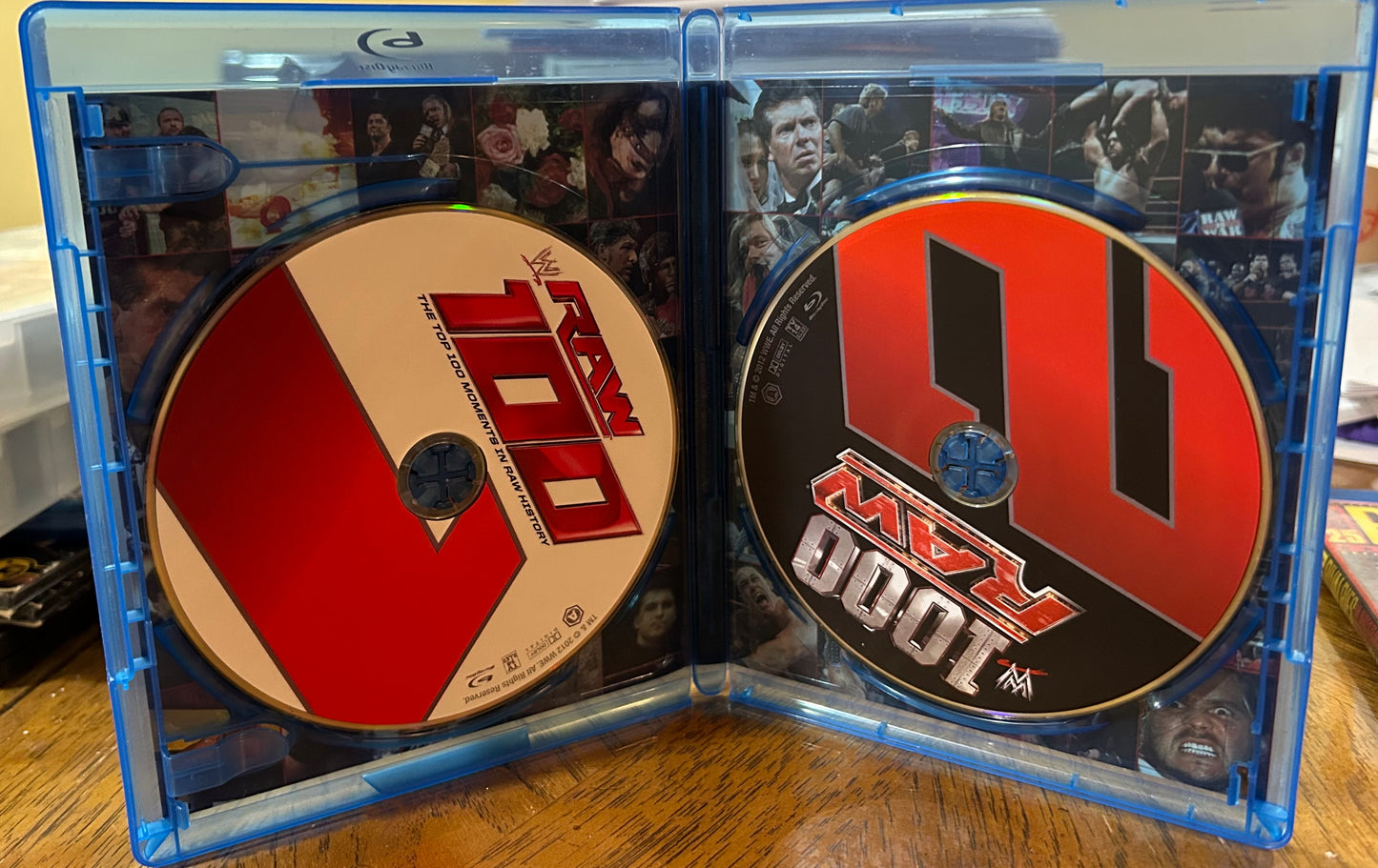 * WWE “The Top 100 Moments in RAW History” Blu-ray (2-Disc Set)
