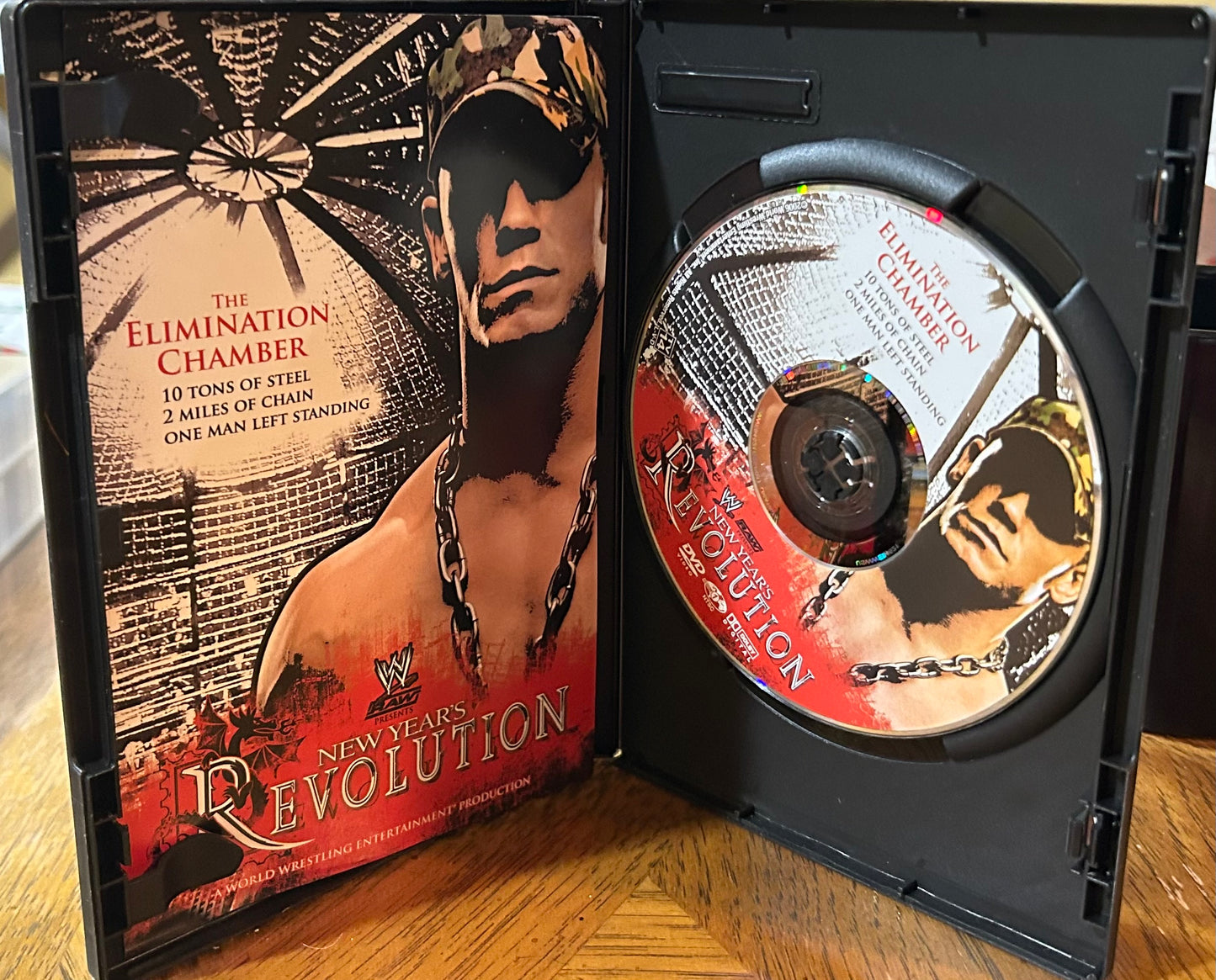 * WWE “New Year’s Revolution 2006” DVD (Cena, Angle, Shawn Michaels & so much more)