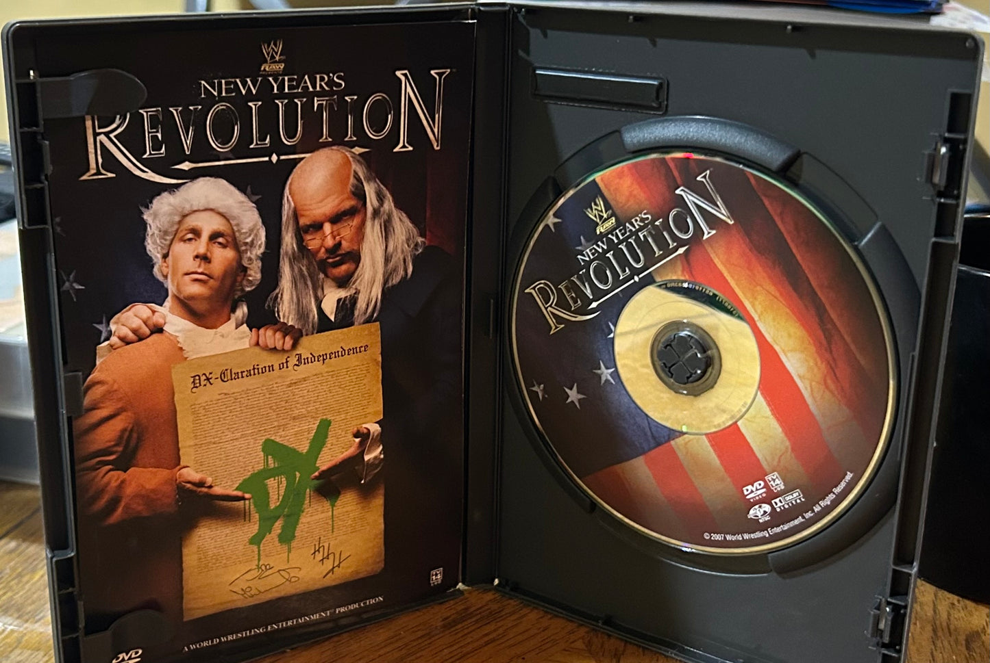 * WWE “New Year’s Revolution 2007” DVD (John Cena, Edge, Triple H & so much more)