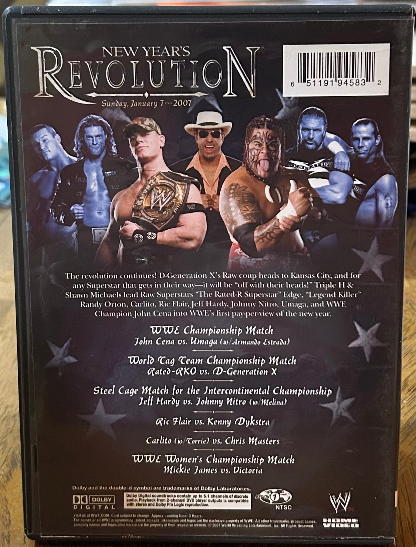* WWE “New Year’s Revolution 2007” DVD (John Cena, Edge, Triple H & so much more)