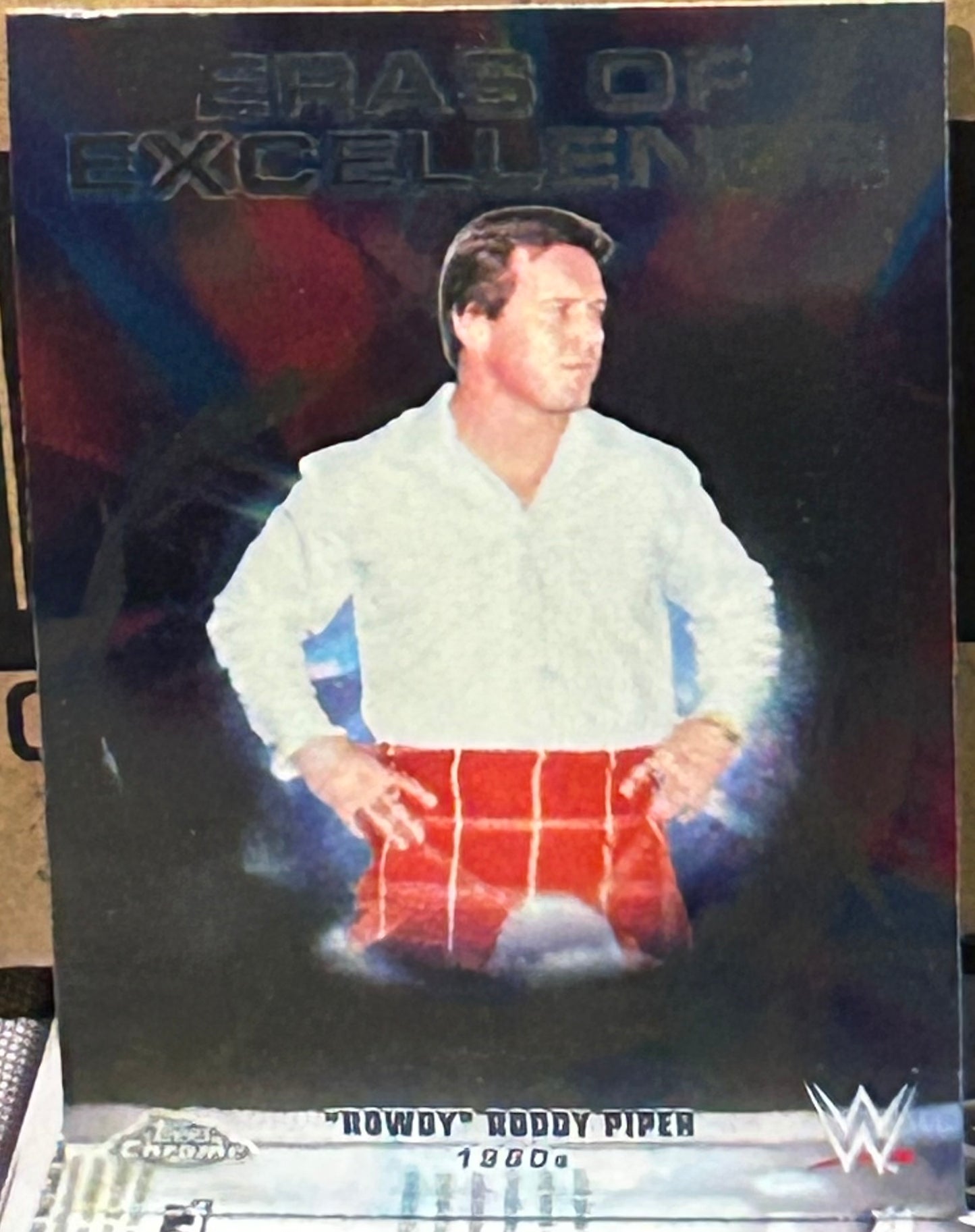 + Rowdy Roddy Piper 2026 WWE Topps Chrome “Eras of Excellence” Insert Card
