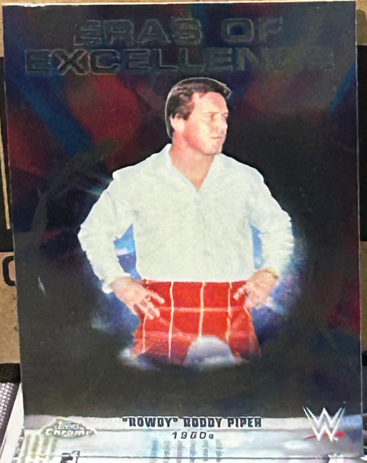 + Rowdy Roddy Piper 2026 WWE Topps Chrome “Eras of Excellence” Insert Card