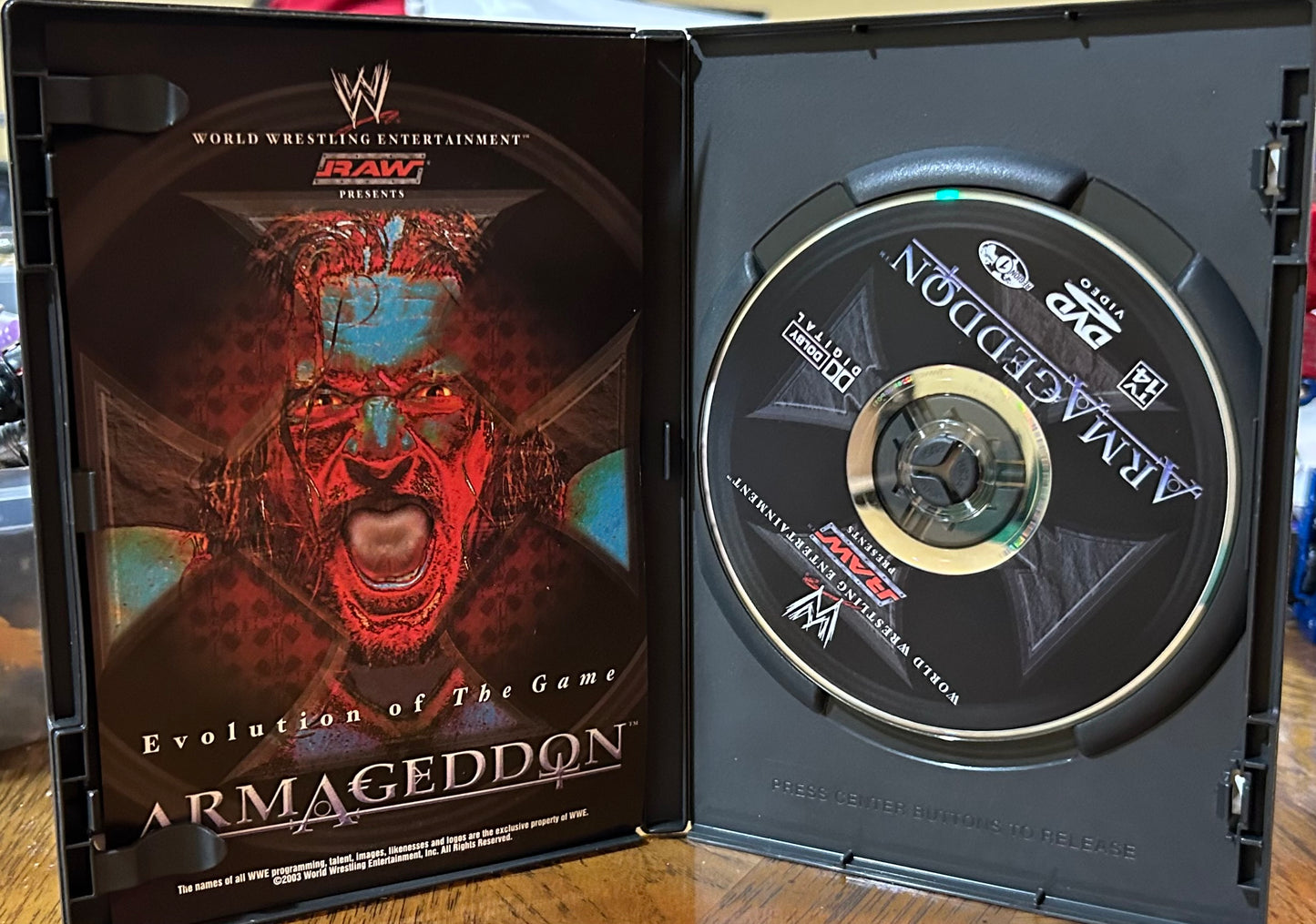 * WWE “Armageddon 2003” DVD (Triple H, RVD, Batista & so much more)