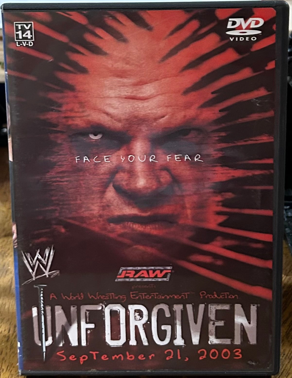 * WWE “Unforgiven 2003” DVD (Triple H, Goldberg, Kane & so much more)