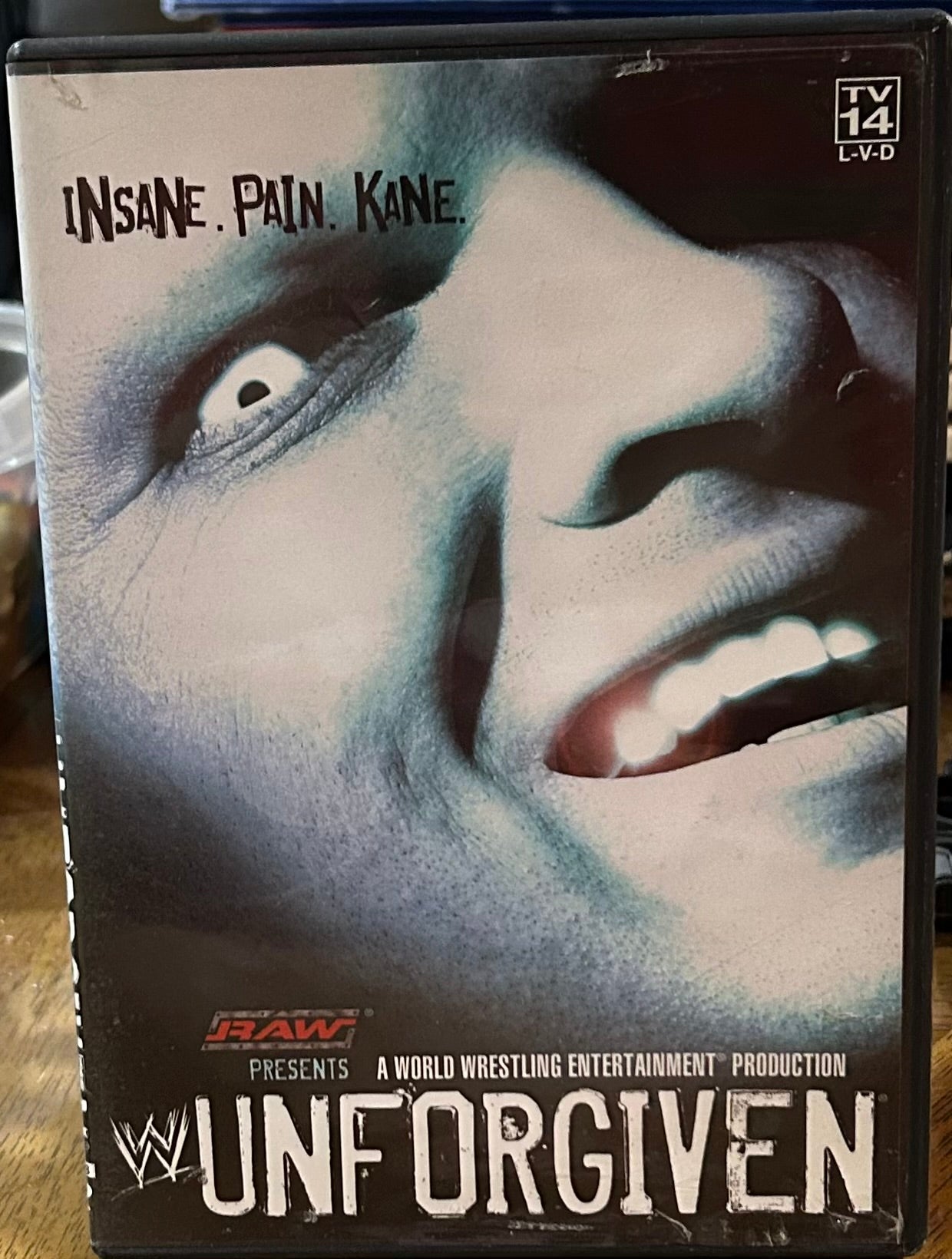 * WWE “Unforgiven 2004” DVD (Orton, Triple H, Kane & so much more)