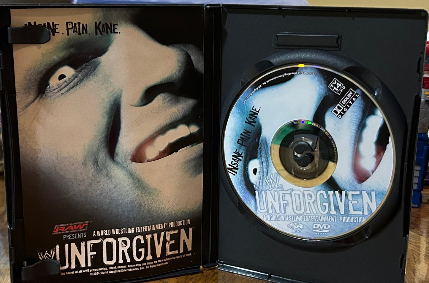 * WWE “Unforgiven 2004” DVD (Orton, Triple H, Kane & so much more)