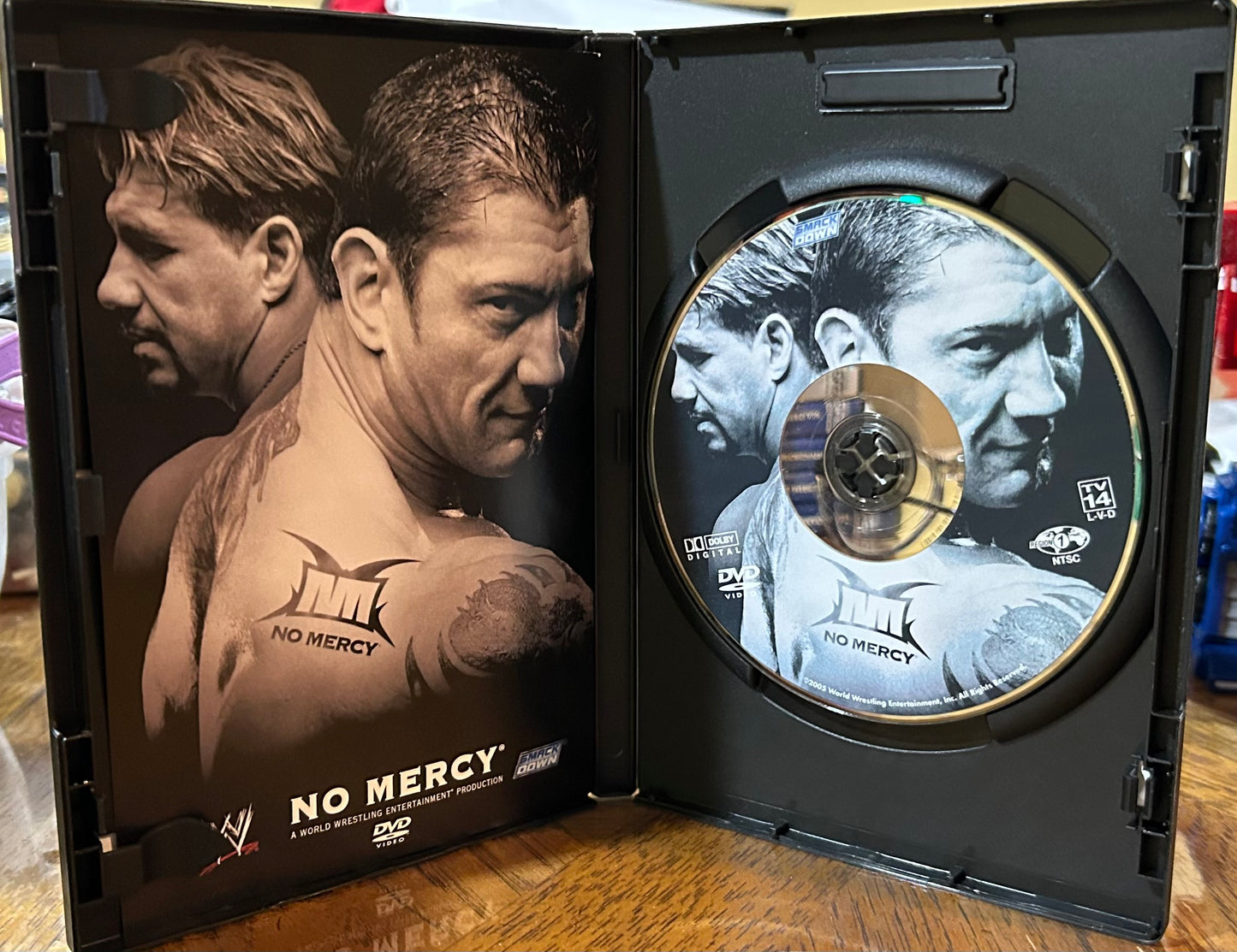 * WWE “No Mercy 2005” DVD (Eddie Guerrero, Undertaker, Benoit & so much more)