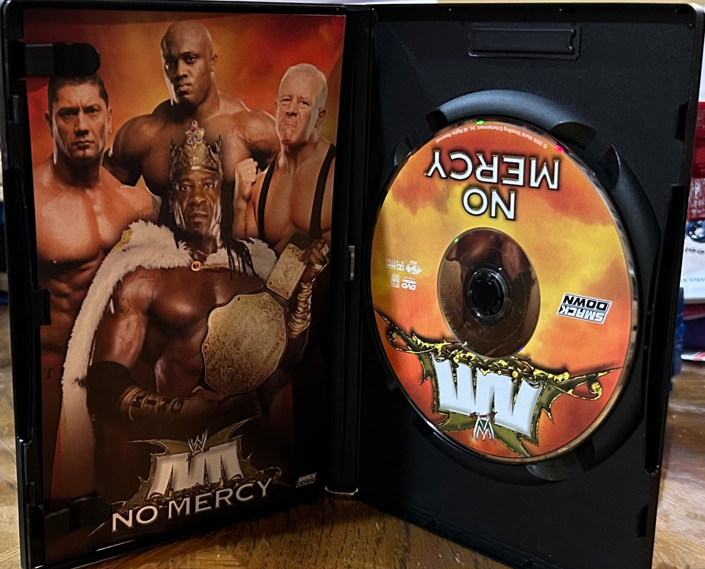 * WWE “No Mercy 2006” DVD (Batista, King Booker, Undertaker & so much more)