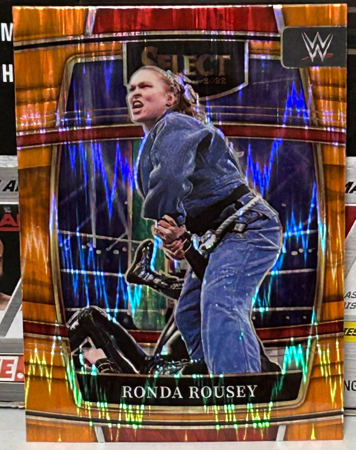 Ronda Rousey 2022 WWE Panini Select Orange Wave Prizm Card
