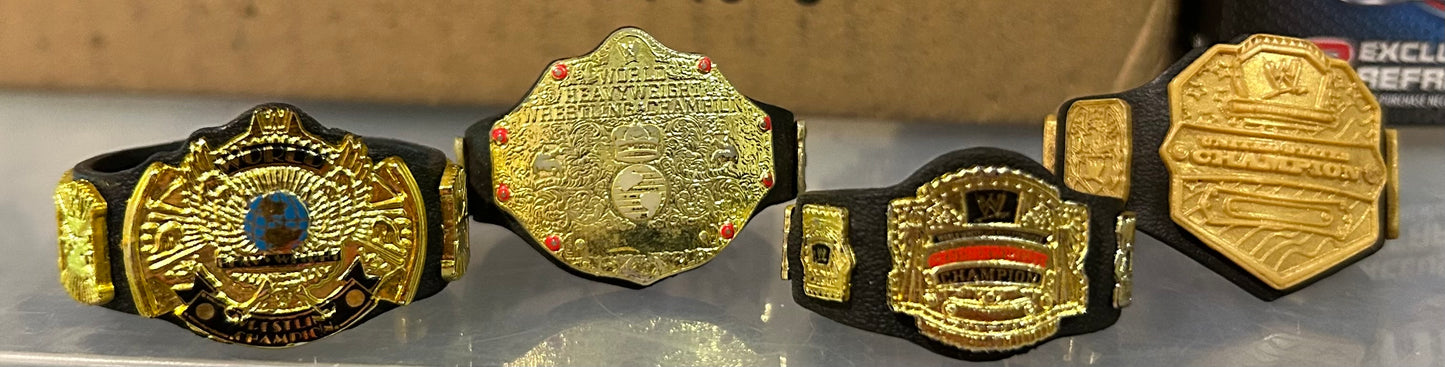 + Lot of 4 Different WWE Championship Belts