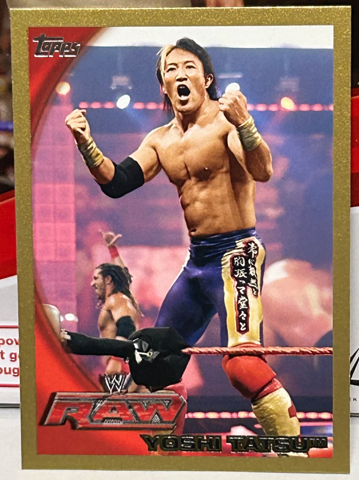 Yoshi Tatsu 2010 WWE Topps GOLD Parallel Rookie Card #21/50