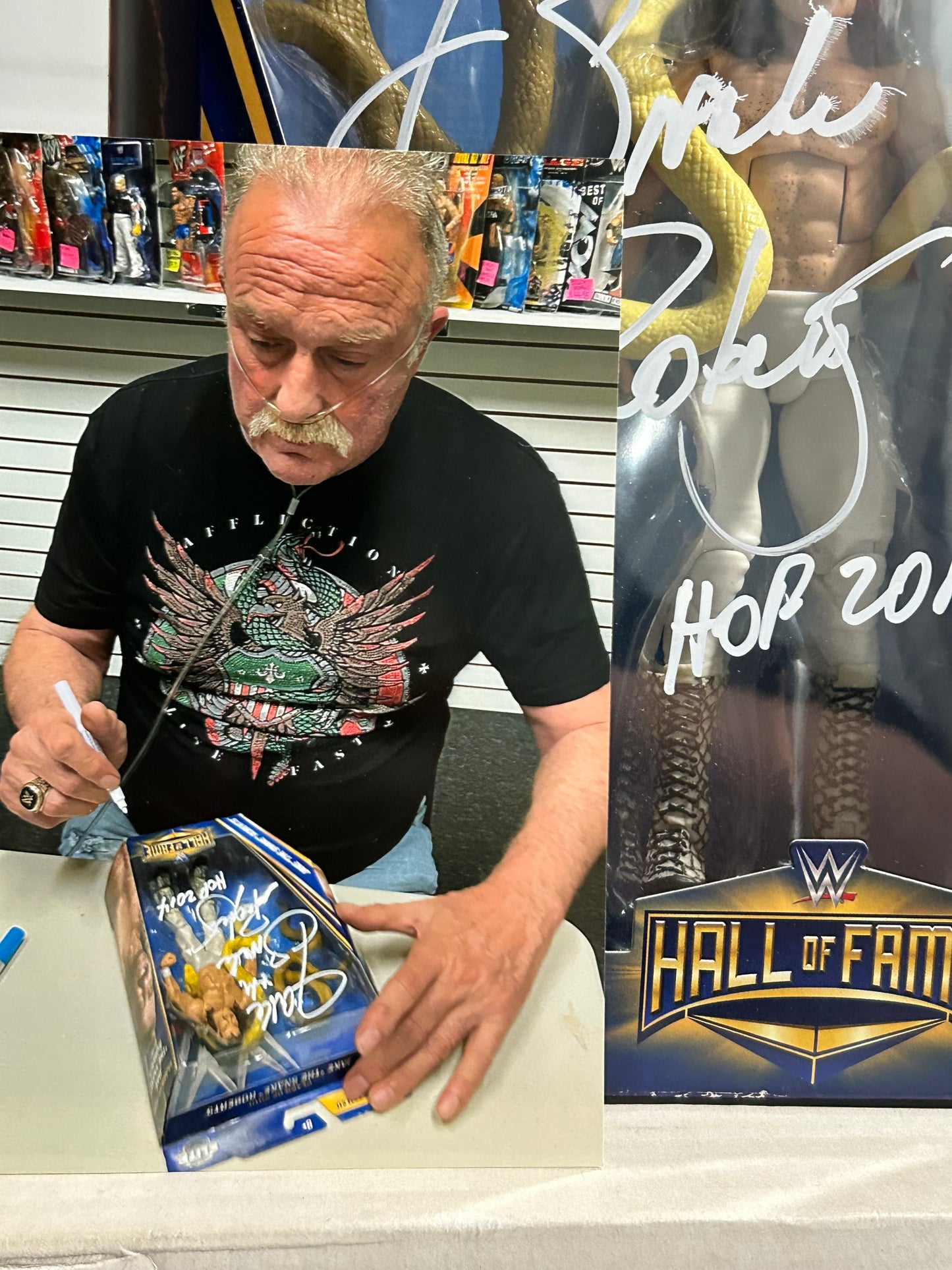 Jake “The Snake” Roberts SIGNED WWE Hall of Fame Elite Action Figure (Comes w/COA& Picture)