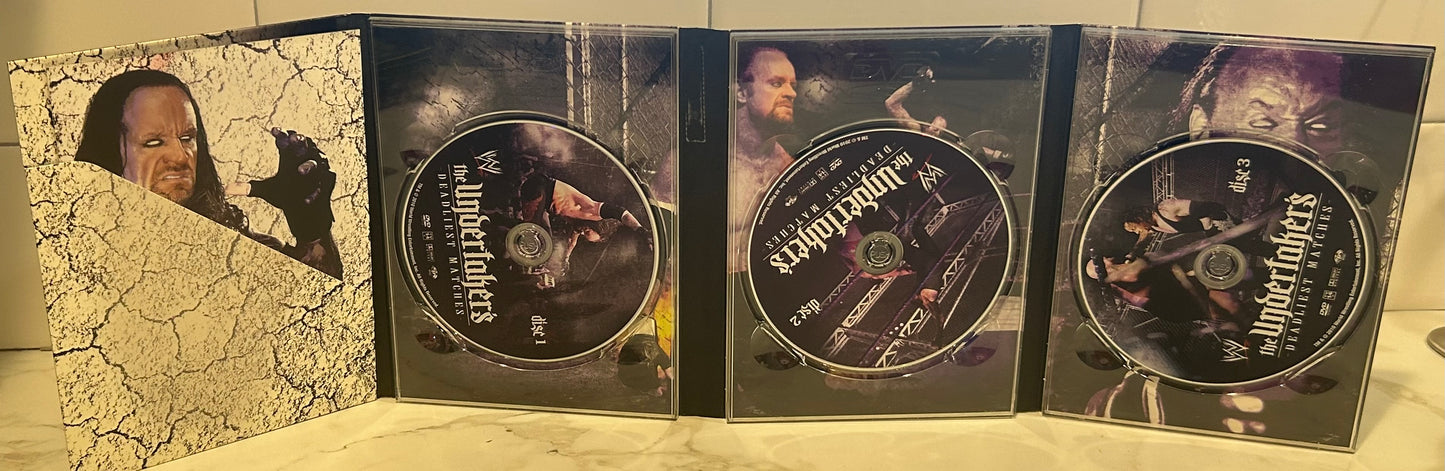 + WWE DVD “The Undertaker’s Deadliest Matches” (3-Disc Set)