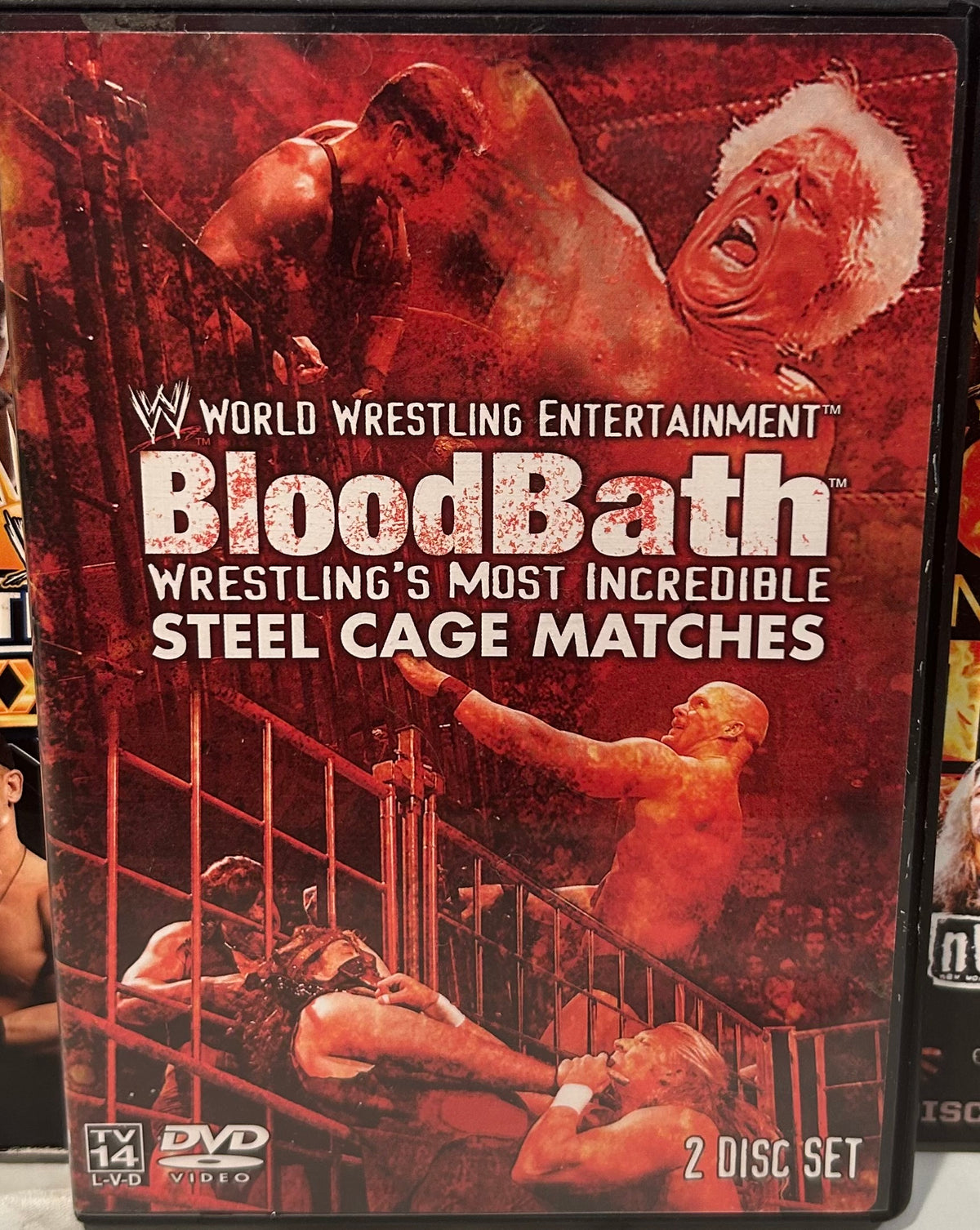 + WWE DVD “Bloodbath, Wrestling’s Most Incredible Steel Cage Matches” (2-Disc Set)