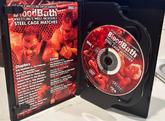 + WWE DVD “Bloodbath, Wrestling’s Most Incredible Steel Cage Matches” (2-Disc Set)