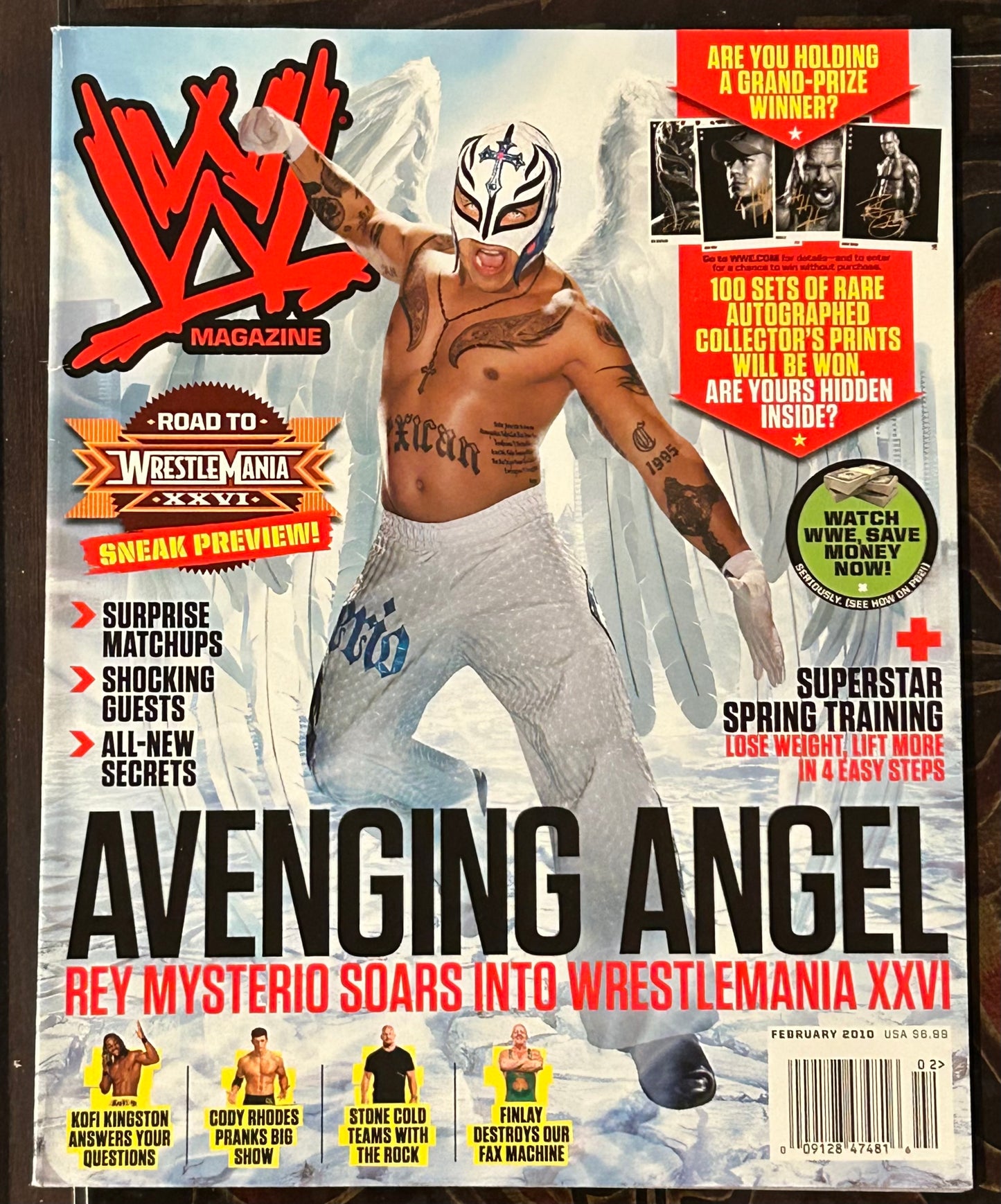 * WWE Magazine Feb 2010 (Comes with 4 Exclusive Black & White Collectible Photos)