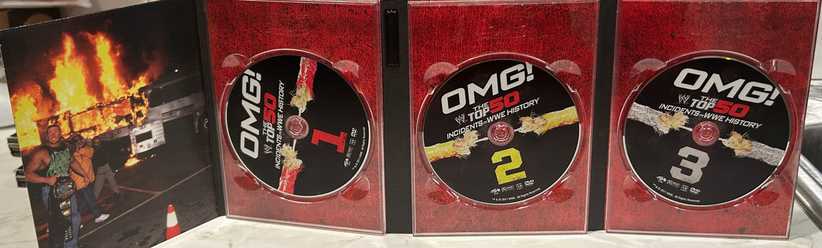 + “OMG! The Top 50 Incidents in WWE History DVD’s” (3-Disc Set)