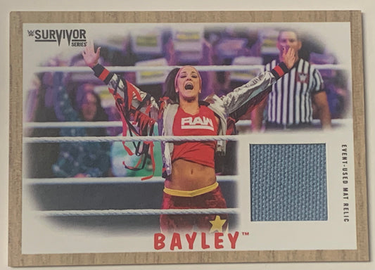 Bayley 2017 WWE Topps “Survivor Series Event-Used Canvas Ring Mat Relic” Card #27/199