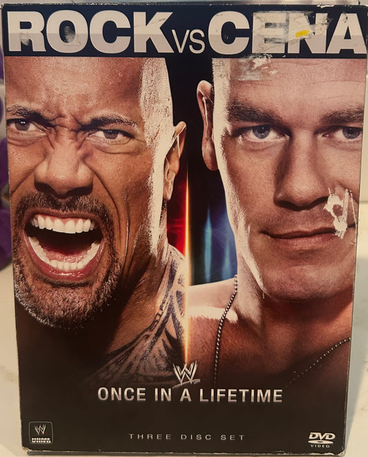 + WWE DVD “Rock vs Cena, Once in a Lifetime” (3-Disc Set)