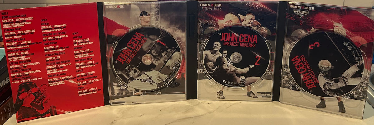 + WWE DVD “John Cena, Greatest Rivalries” (3-Disc Set)