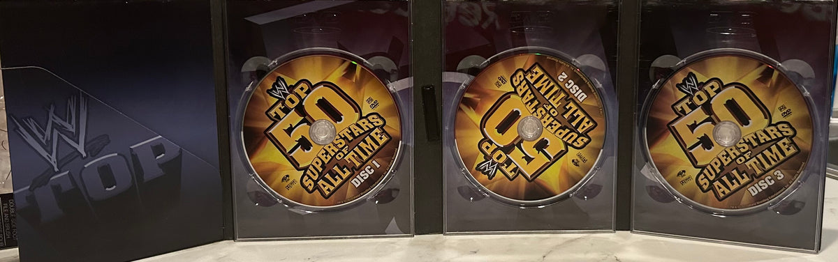 + WWE DVD “Top 50 Superstars of All Time” (3-Disc Set)