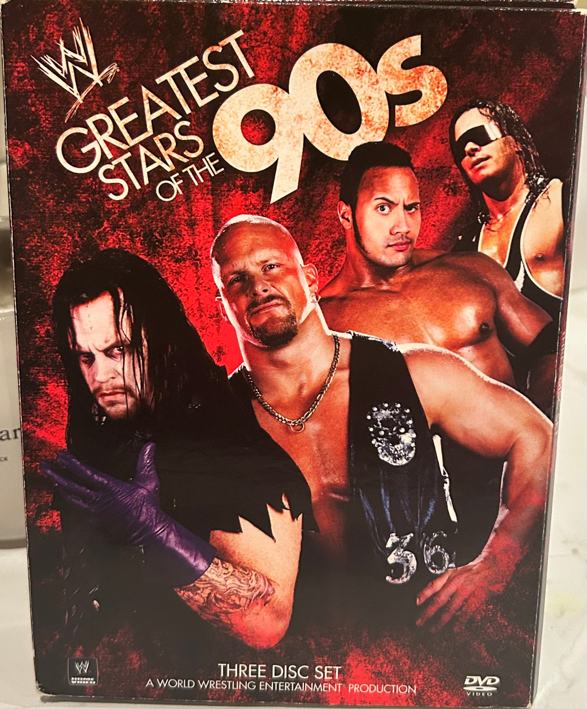+ WWE DVD “WWE Greatest Stars of The 90’s” (3-Disc Set)