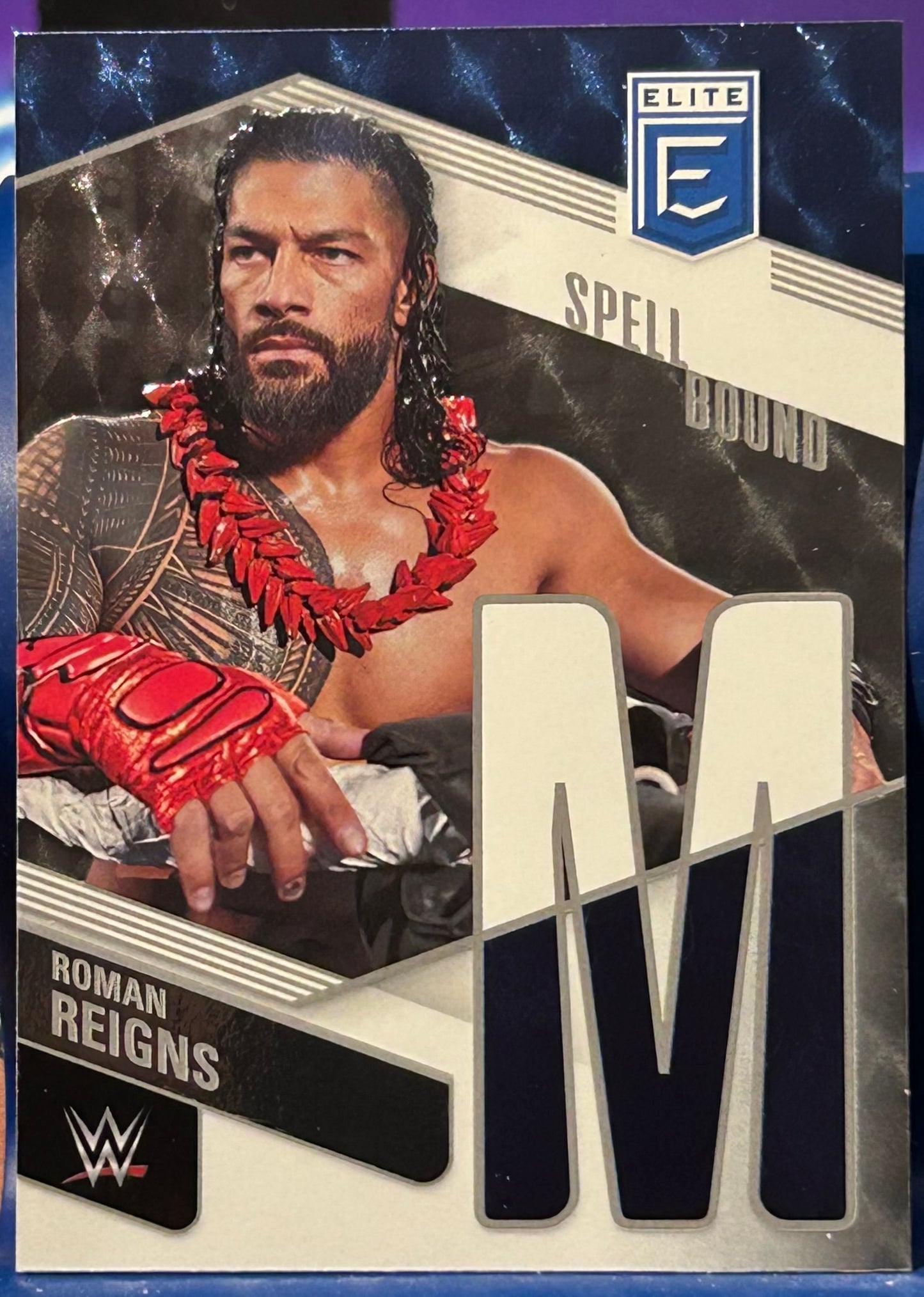 * Roman Reigns 2023 WWE Donruss Elite Spellbound “M” Card