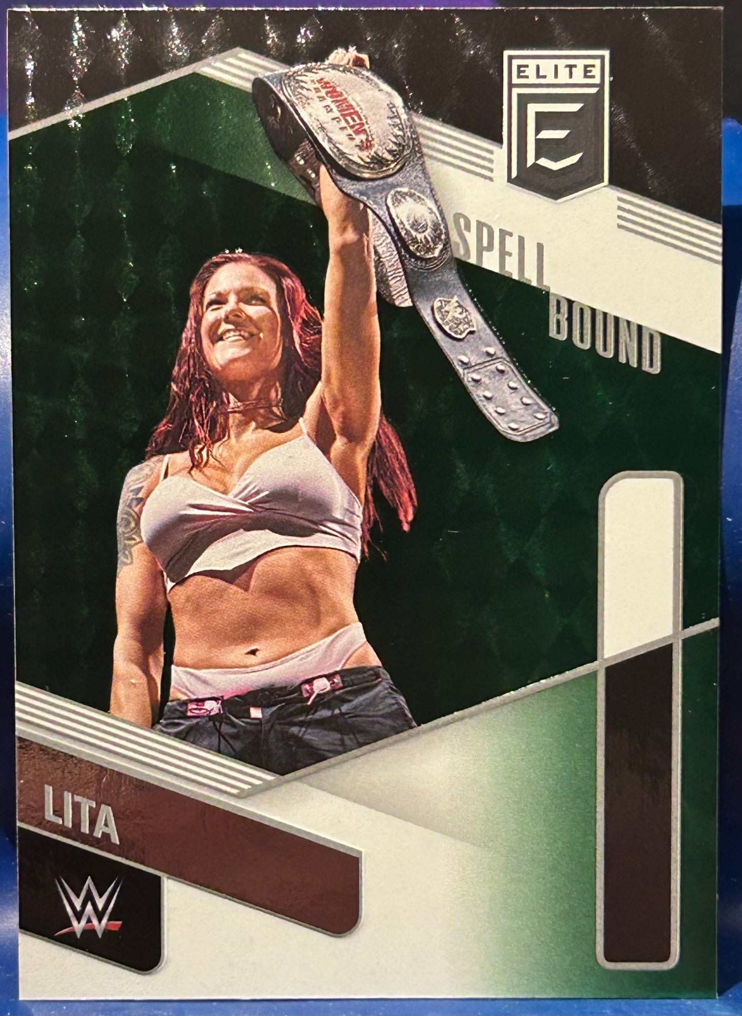 * Lita 2023 WWE Panini Donruss Elite SPELLBOUND “I” Green Parallel Card