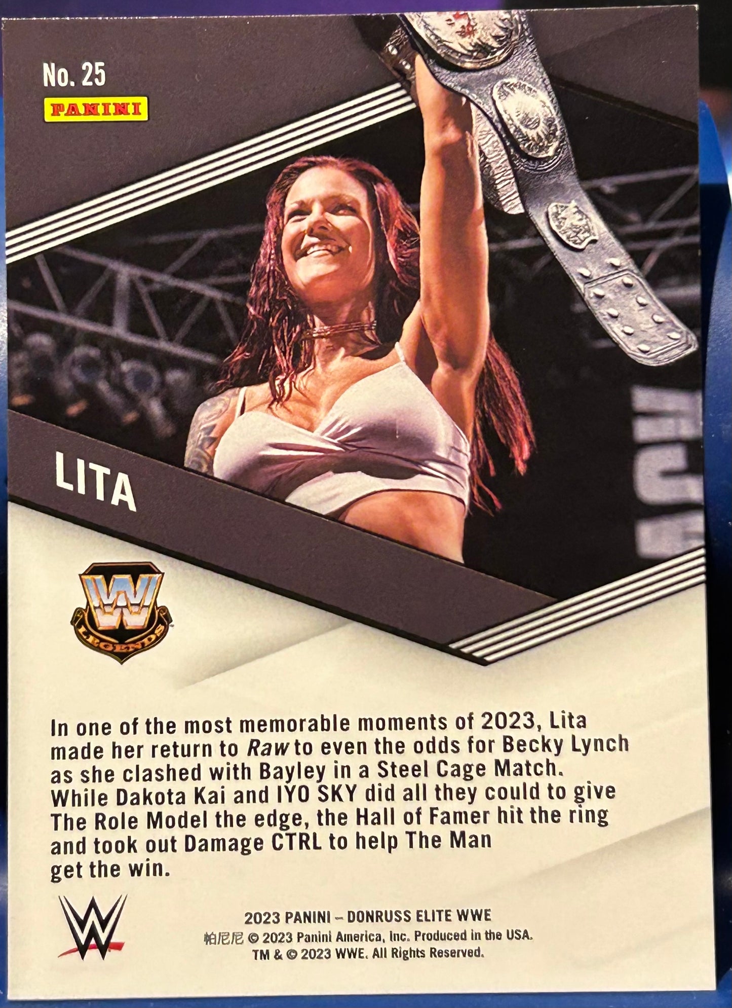 * Lita 2023 WWE Panini Donruss Elite SPELLBOUND “I” Green Parallel Card