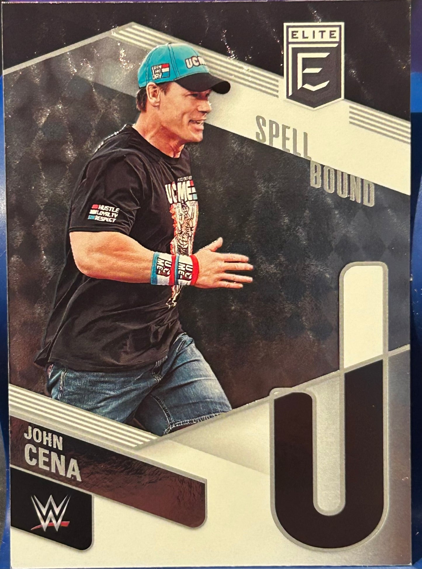 * John Cena 2023 WWE Panini Donruss Elite SPELLBOUND “J” Insert Card