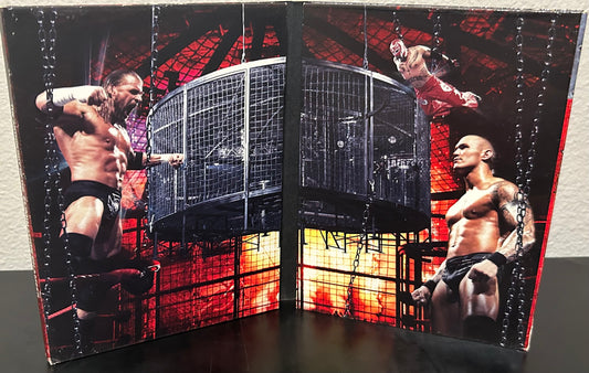 + WWE DVD “Satan’s Prison, The Anthology of The Elimination Chamber” (3-Disc Set)