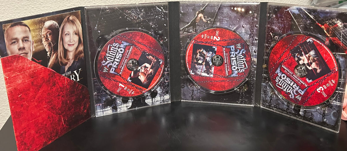 + WWE DVD “Satan’s Prison, The Anthology of The Elimination Chamber” (3-Disc Set)
