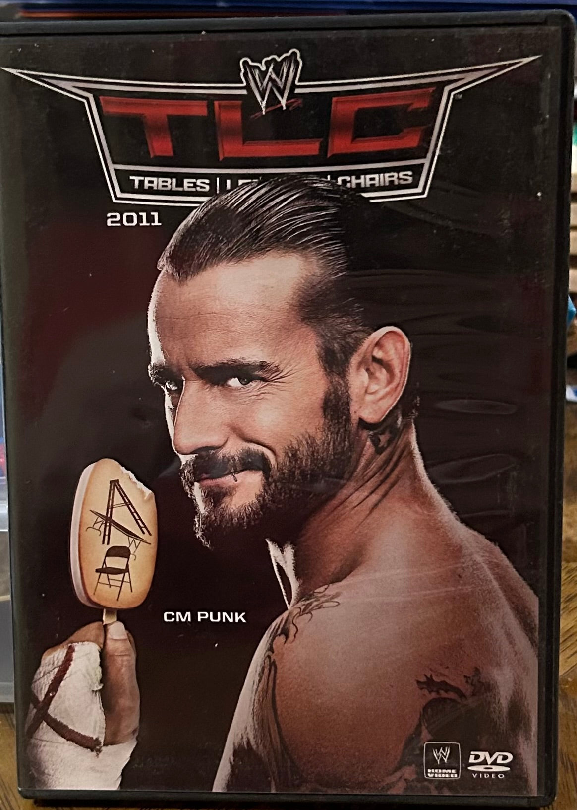 * WWE “TLC Tables, Ladders & Chairs 2011” DVD (CM Punk, Triple H, Kevin Nash & so luch more)