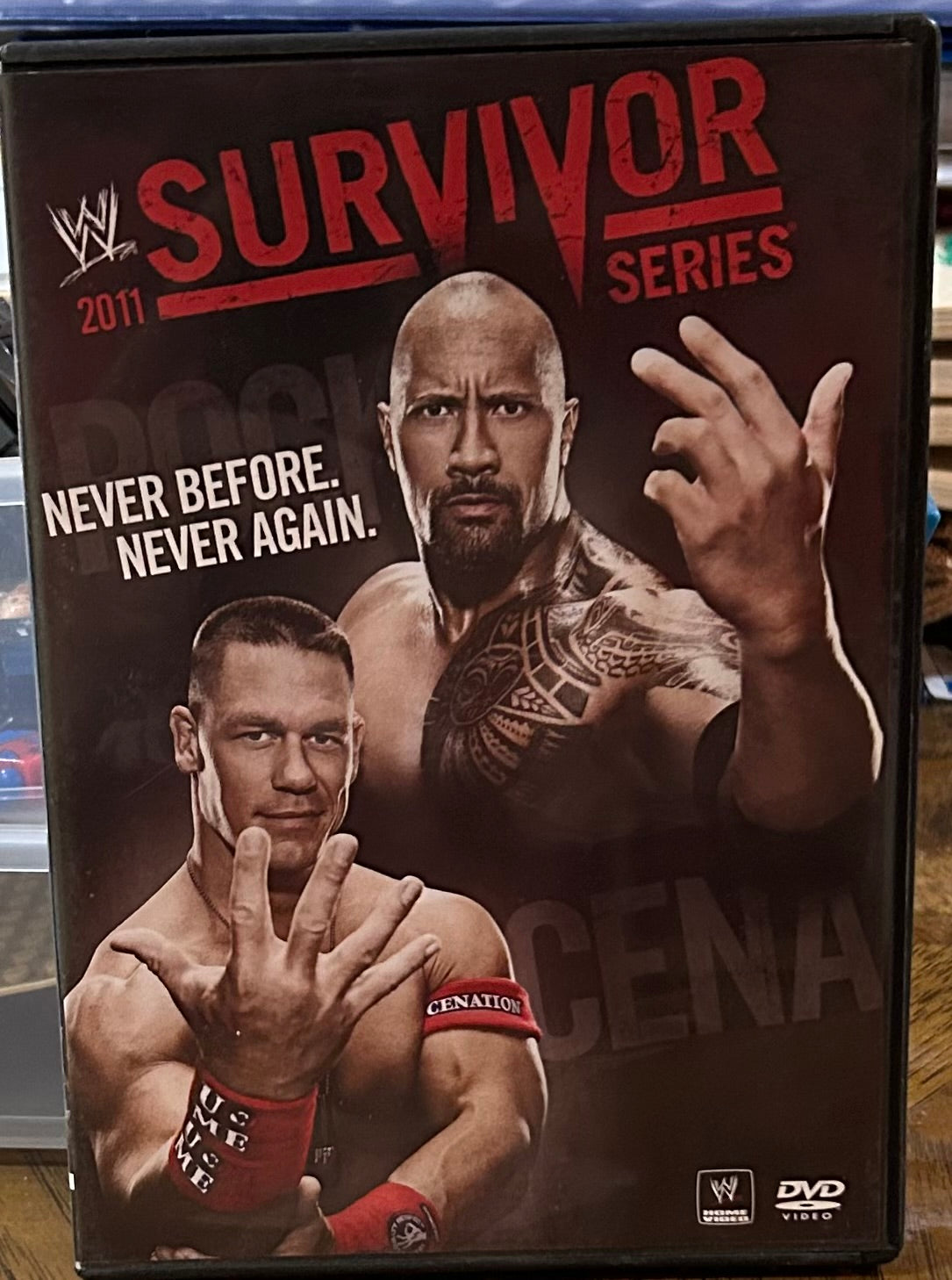 WWE “Survivor Series 2011” DVD (John Cena, The Rock)