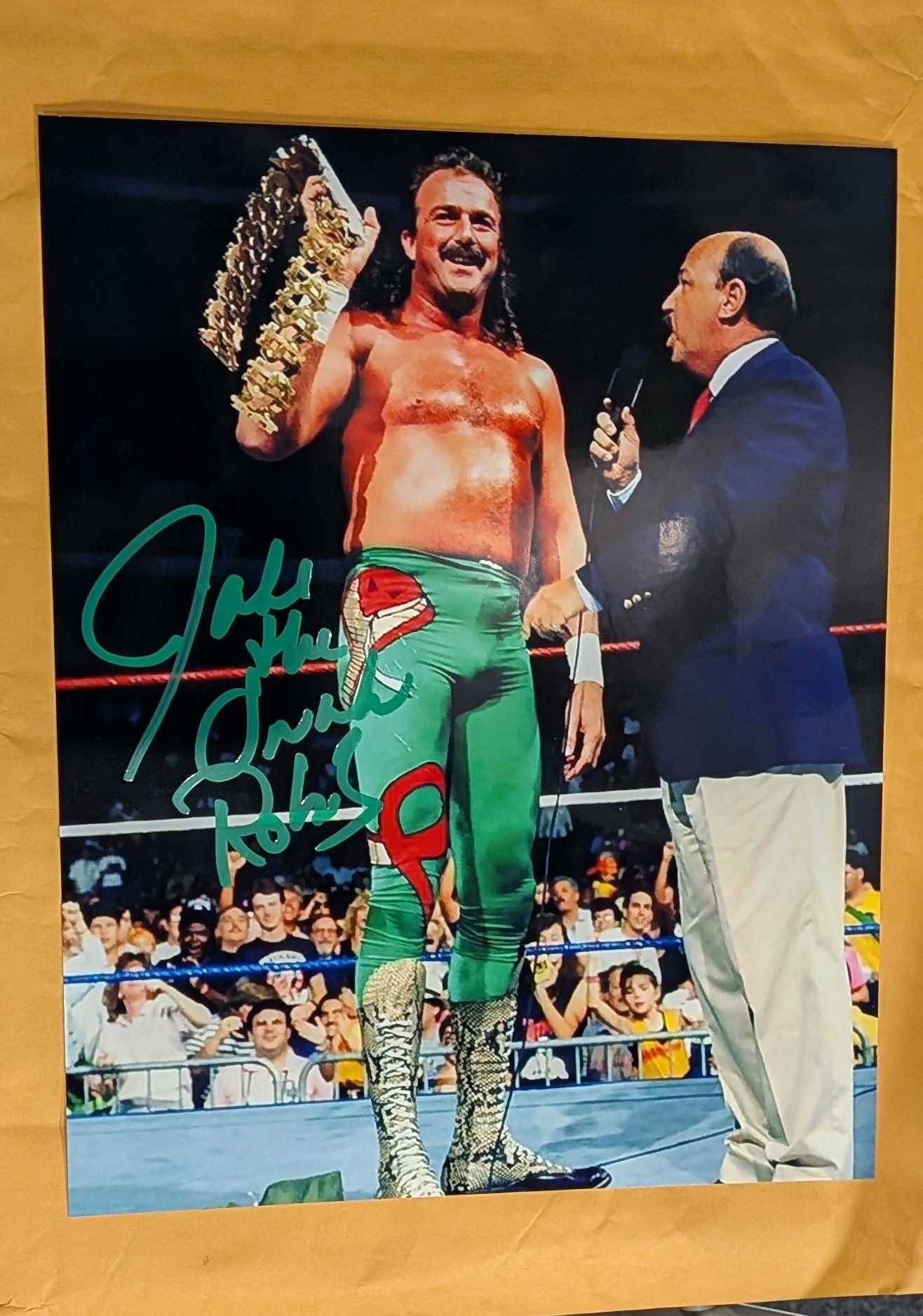 + Jake “The Snake” Roberts Signed WWE 8x10 Color Photo (Comes w/COA)