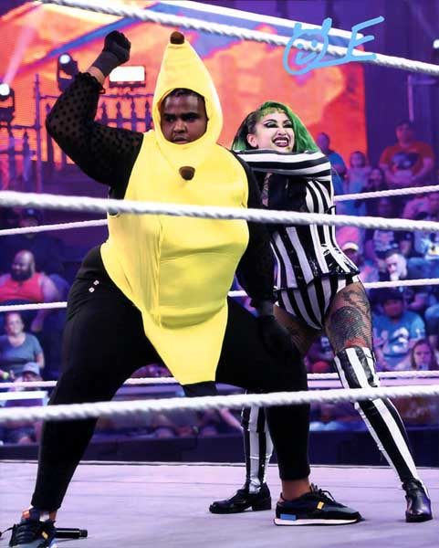Quincy Elliott WWE Signed 8x10 Color Photo (Comes w/COA)
